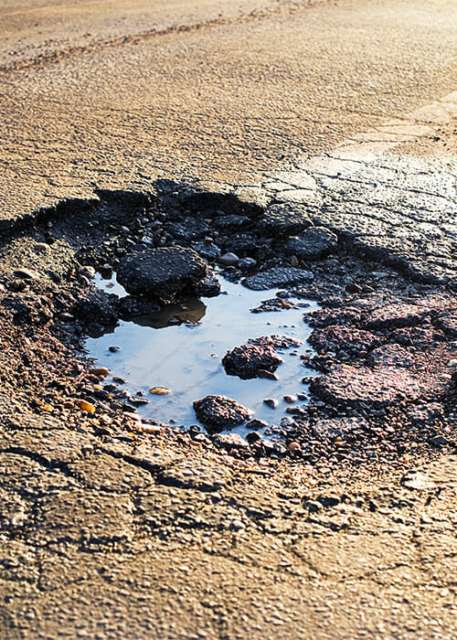 damaged asphalt and how to fix it
