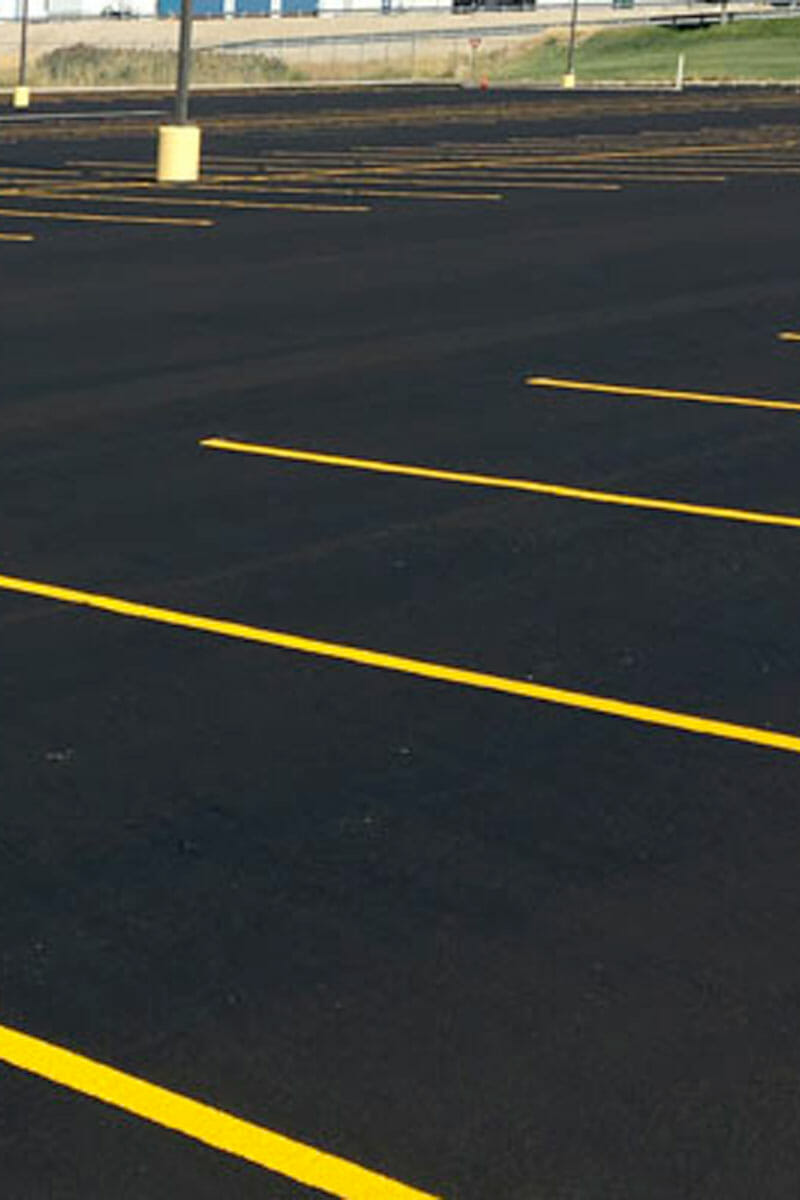 parking lot with asphalt and freshly painted lines