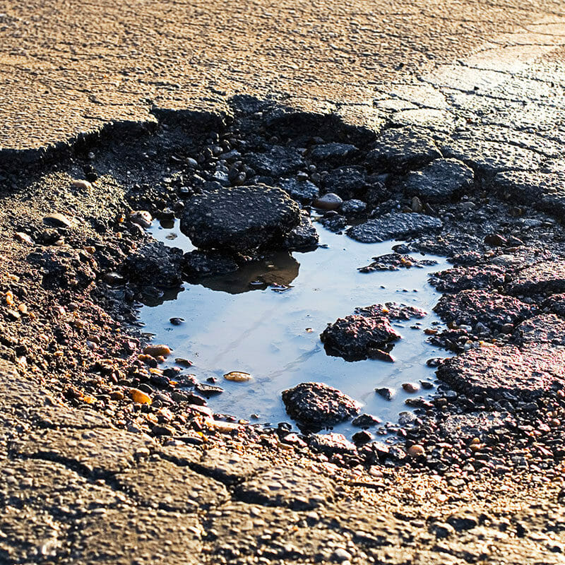 pot holes - asphalt depressions - asphalt needing repair