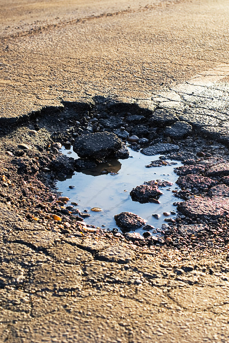 pot holes - asphalt depressions - asphalt needing repair