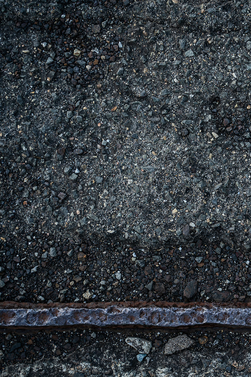 asphalt raveling | rocky asphalt | asphalt needing repair