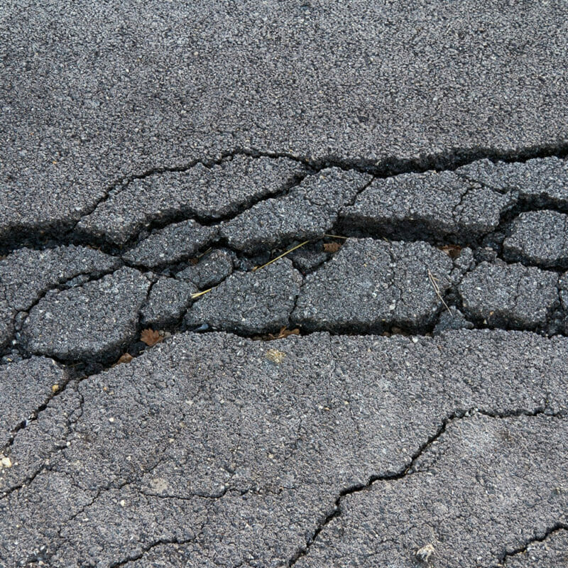 cracked asphalt neeeding asphalt repair services